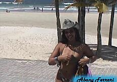 Exposing big tits and ass on the beach