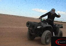 European couple fucks outdoors in Sinai desert, her on motorbike, with Italian dialogues.
