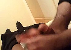 Miss K gives footjob in fishnets.