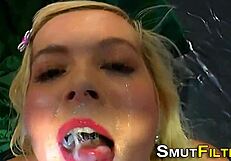 the slut gets facialized in a blowbang and swallows every drop