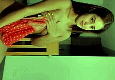 Cute teen 18+ performs striptease undressing slowly