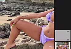 African beauty in bikini on the beach gets me jerking off.