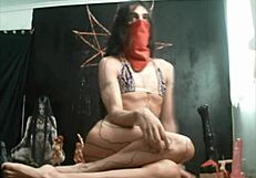 Ladyboy enjoys big dildos anally