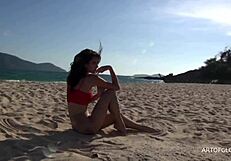 monika in shiny pantyhose on the beach