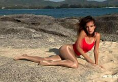 monika in shiny pantyhose on the beach