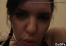 Teasing nymphet plays on cam with pigtails and shaved body.