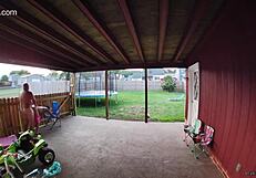 wife sucking and fucking into a creampie on back porch as cars drive by