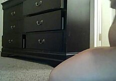 white girl plays with huge black dildo in close up