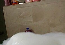 Cyno enjoys a relaxing bubble bath in cosplay.