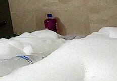 Hot babe Cyno performing solo play in bubbles