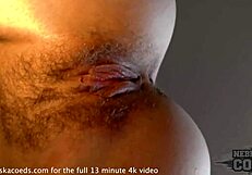 pretty brunette tries dildo for first time on sofa