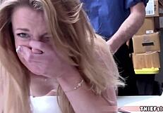 Watch this pretty faced blonde shoplifter pay with her tight pussy!