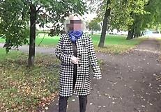 Young naked mature woman in tights shows her large breasts