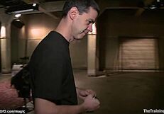 Strapped gimp performs rough anal fucking on submissive blond trainee in bondage.