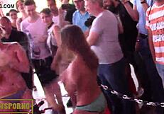 A beautiful young woman first twirls and then gets intimate