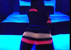 Check Out This Ebony Babe Dancing in Blacklight!