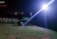 Bruna gives blowjob in club parking lot.