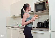 Beautiful brunette housekeeper licks landlord's cock in the kitchen. she helps him relax with her small tits.