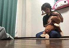 Horny amateur girl masturbates with doll thinking it's a man.