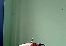 Hey, check out this Indian lesbian getting fucked by a brinjal in her pussy