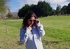 Beautiful young girl gets sensual massage in a park