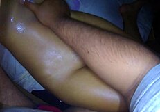 He gives an erotic massage to his stepsister, playing with her pussy as she moans in pleasure