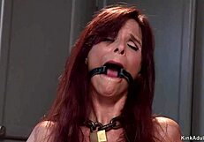 Bound milf housewife gags on master's cock in deep submission.