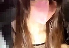 Beautiful Asian ladyboy shows ass in shade while masturbating