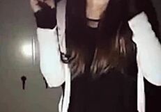 Beautiful Asian ladyboy shows ass in shade while masturbating