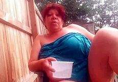 This is a video of a young girl that opens her blouse to reveal her large boobs and later opens her pants to show off her shaved pussy