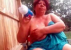 This is a video of a young girl that opens her blouse to reveal her large boobs and later opens her pants to show off her shaved pussy