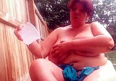 This is a video of a young girl that opens her blouse to reveal her large boobs and later opens her pants to show off her shaved pussy