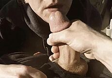 Nerd milf sucks big cock in parking lot