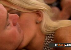 Naughty blonde pleases all the swingers at the swing mansion