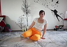 Yoga instructor guides cute babe through femdom poses, emphasizing her big ass, natural tits, and shaved pussy in amateur session