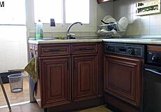 Is she horny enough to fuck in the kitchen? Teen milf with big ass.