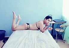 The hot young gay guy touches himself in his room while crossdressing