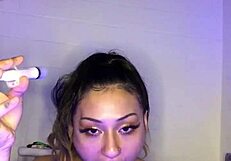 mia plays with her big dildo toy in wet session