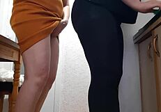 Two housekeepers take turns taking breaks while working in the kitchen