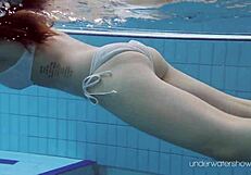 roxalana cheh, that sexy redhead, looks stunning underwater