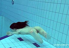 roxalana cheh, that sexy redhead, looks stunning underwater