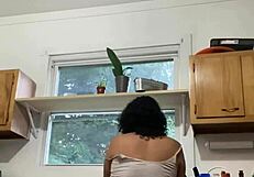 Latina milf enjoys doing the dishes