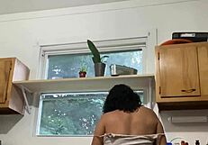 Latina milf enjoys doing the dishes