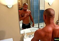 Why does tattooed black jock stroke that huge dong?