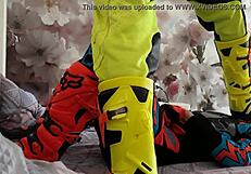 gay biker in motocross costume gets boots tread 😏