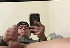 Watch the sexy blonde frat guy masturbate in front of the mirror, contrasting his cumshot everywhere.