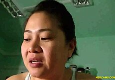 an amateur asian girl teases with her big tits before giving a blowjob on webcam