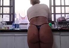 Washing the sink in just panties at father-in-law's house.