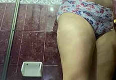Hooters girl with tattooed, gets caught on button cams peeing in the lavatory