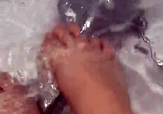 i take off my nylon stockings and step into the shower, teasing with my feet